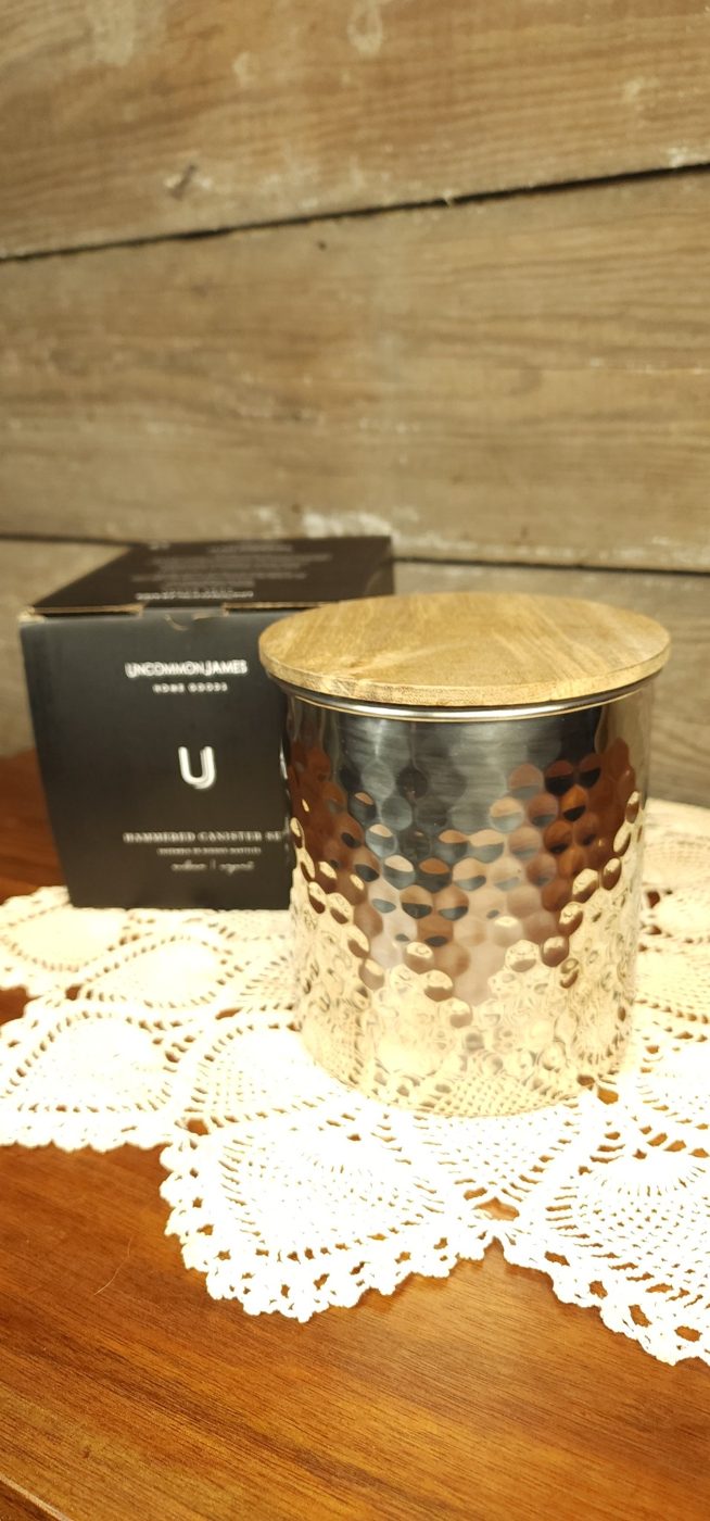 Uncommon James hammered silver canister set